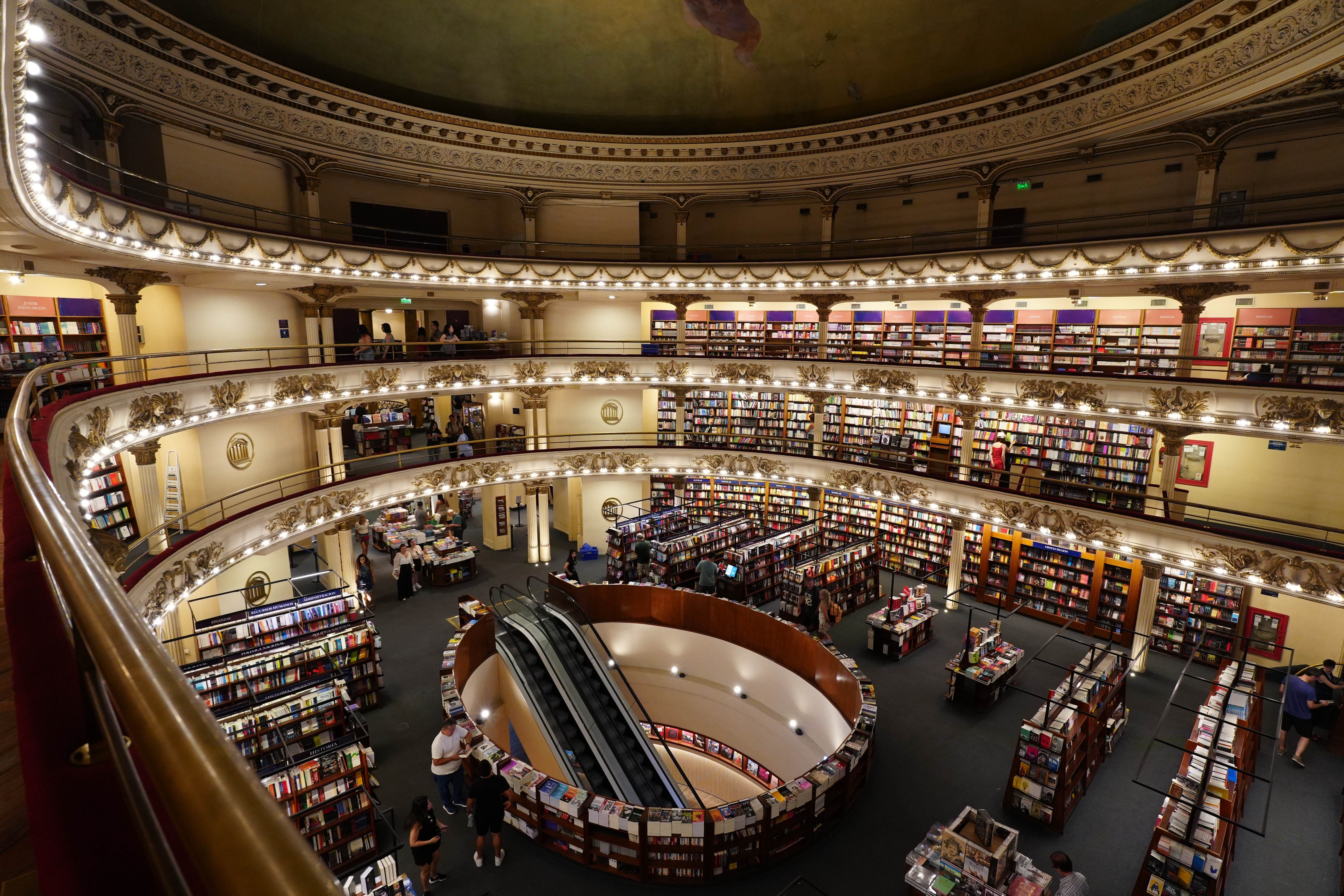 Balcony corner view with column and bookshelf detail.