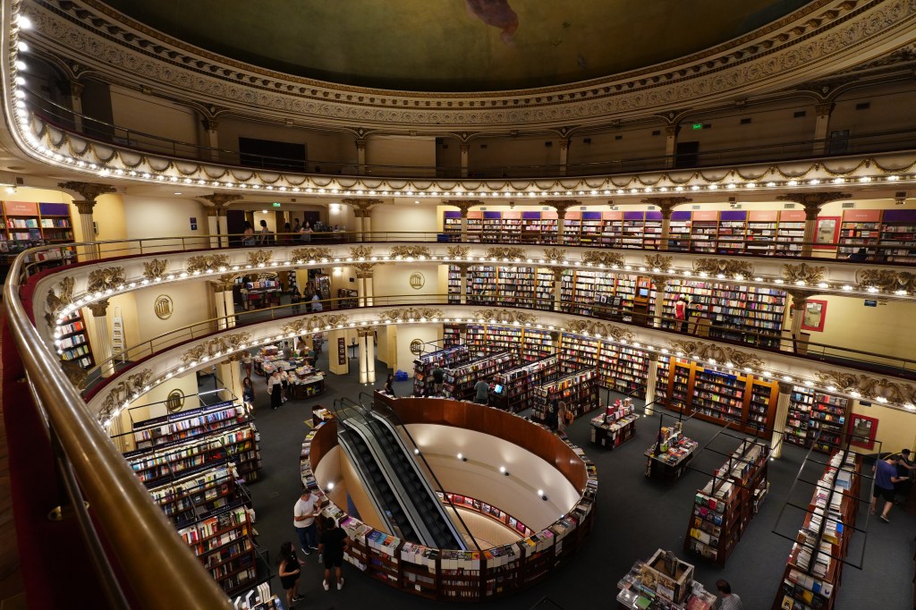 Balcony corner view with column and bookshelf detail.