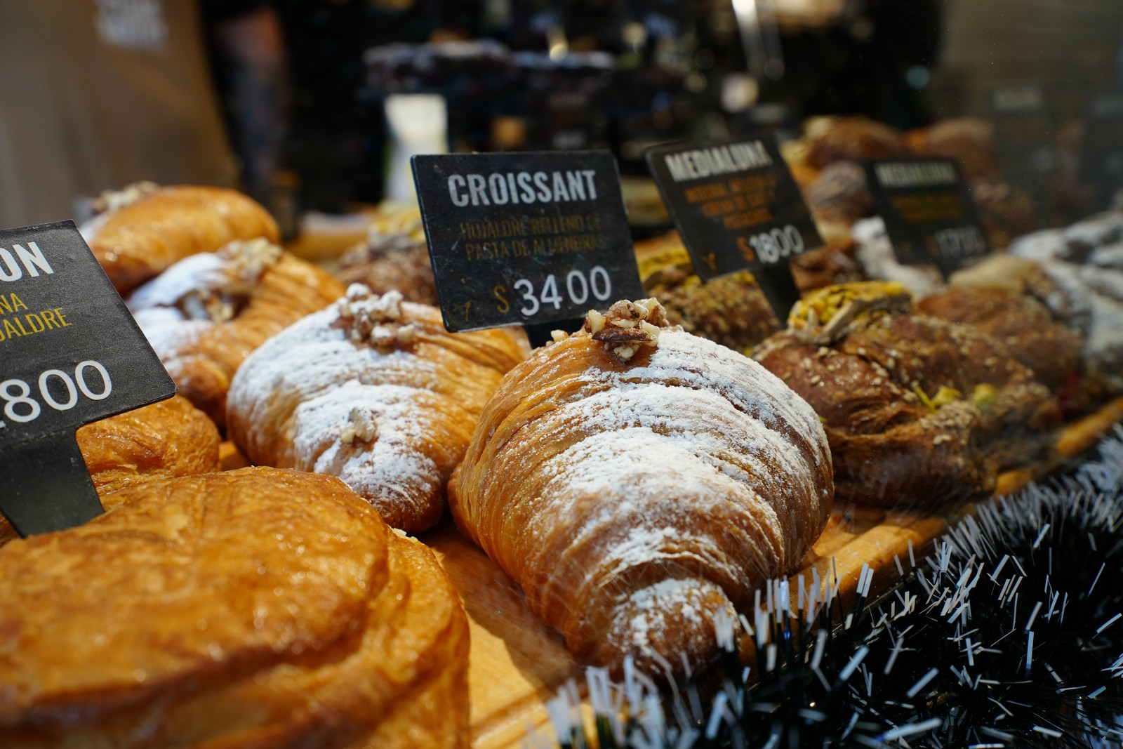 Flaky croissants with powdered sugar