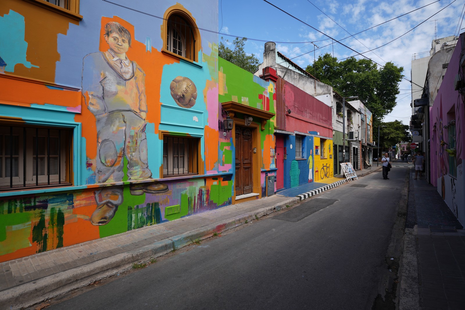 Colorfully painted homes along a quiet street in Buenos Aires