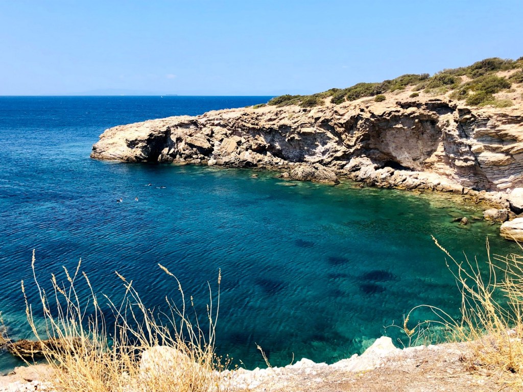 Turquoise cove along the coastal drive to Cape Sounion, Greece