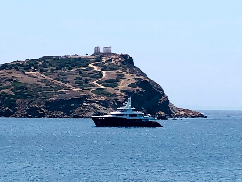 View of the Cape Sounion headland and Temple of Poseidon from the water
